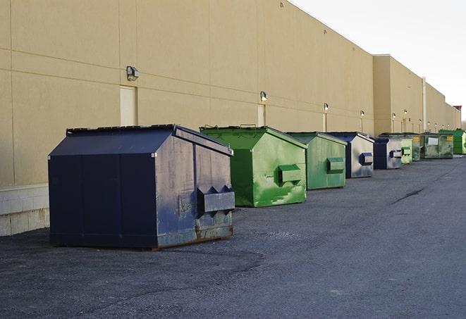 an empty dumpster ready for use at a construction site in Acworth, GA